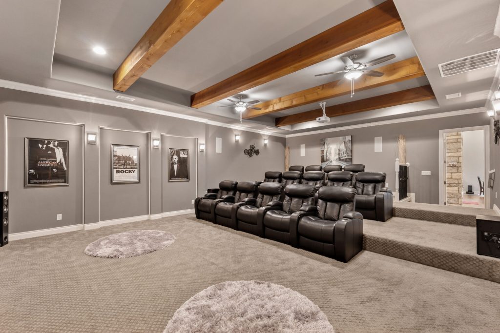 cozy home theater with modern lighting after commercial renovation in milton.